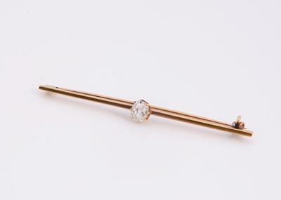 Lot 91 - A yellow metal diamond set bar brooch