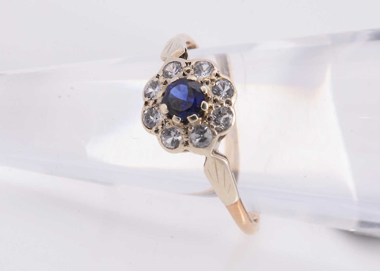 Lot 96 - A 9ct gold diamond & sapphire cluster dress ring