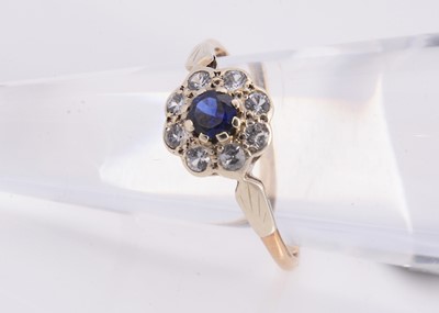 Lot 96 - A 9ct gold diamond & sapphire cluster dress ring