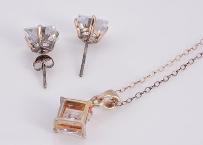 Lot 97 - A silver square paste set pendant necklace with matching stud earrings