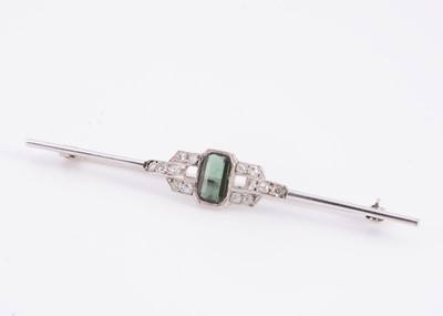Lot 98 - An Art Deco tourmaline & diamond set white metal bar brooch