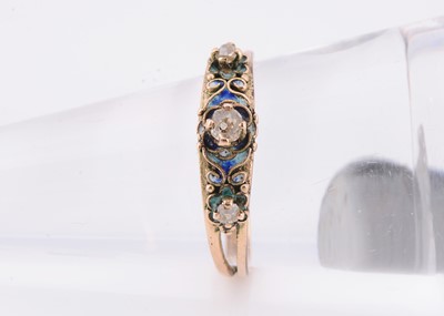 Lot 108 - A yellow metal enamelled & diamond ring