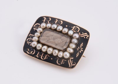 Lot 127 - An late Georgian seed pearl & enamel mourning brooch