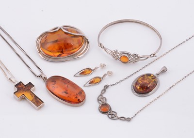 Lot 136 - A silver Celtic amber set bangle & necklace