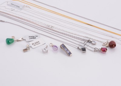 Lot 142 - A collection of silver various gem set pendants & chains