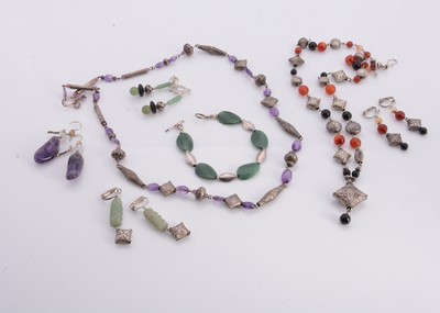Lot 154 - A collection of ethic style white metal jewellery items