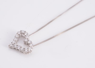 Lot 169 - A 18ct white gold diamond set heart pendant with 9ct chain