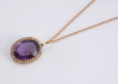 Lot 177 - An Victorian 15ct gold amethyst and seed pearl pendant & 9ct gold chain