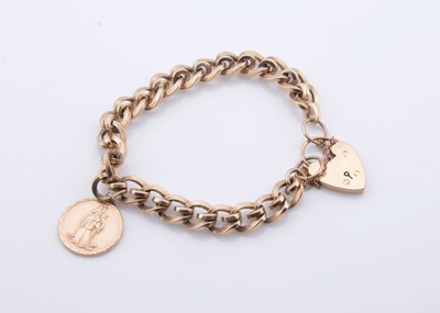Lot 180 - A 9ct gold fancy link curb style bracelet with st Christopher