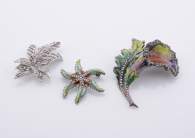 Lot 195 - Two white metal art nouveau style enamel & marcasite set brooches
