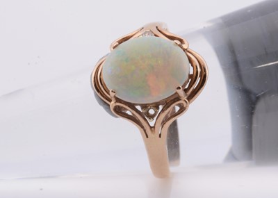 Lot 200 - A 14ct gold opal set dress ring