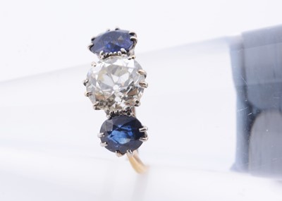 Lot 201 - A diamond & sapphire three stone ring