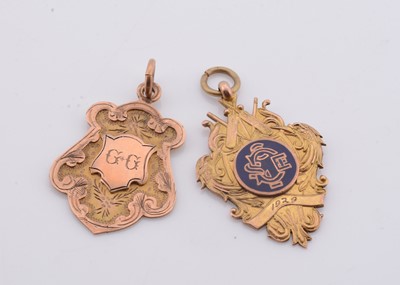 Lot 207 - Two 9ct gold sporting medallions