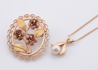 Lot 231 - A 14k gold pearl pendant necklace & bi colour flower brooch