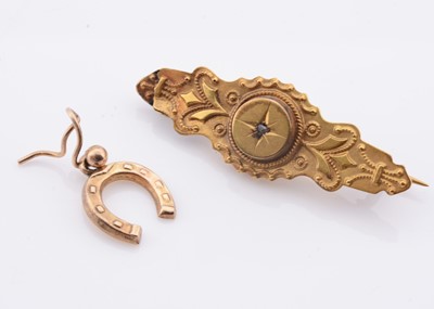 Lot 233 - An Victorian 9ct golf mourning brooch