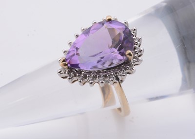 Lot 234 - A 9ct gold pear shape amethyst cluster ring