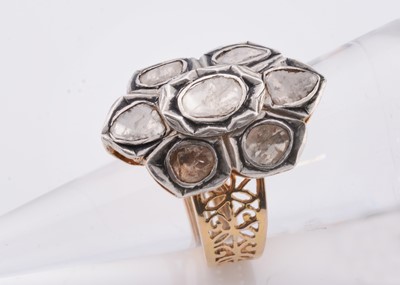 Lot 235 - A polki ring with filagree work shank