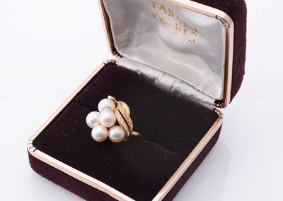 Lot 239 - An Tasaki 18k gold cultured pearl cluster ring