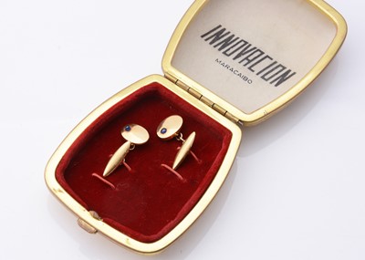 Lot 244 - a pair of 18k gold Innovacion cufflinks