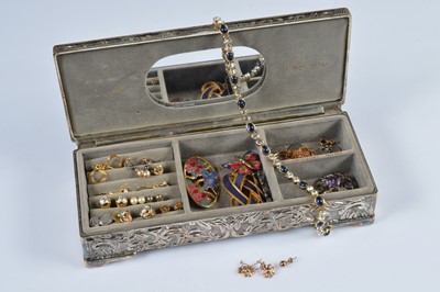 Lot 262 - A Celtic purple gem set silver brooch & collection of costume jewellery in a embossed silver jewellery box
