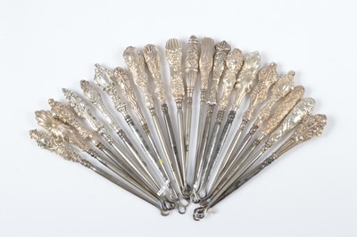 Lot 269 - Twenty silver handled button hooks