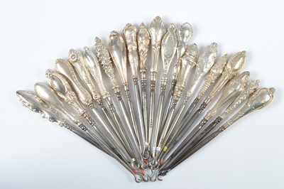 Lot 275 - Twenty silver handled button hooks