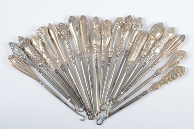 Lot 276 - Twenty silver handled button hooks