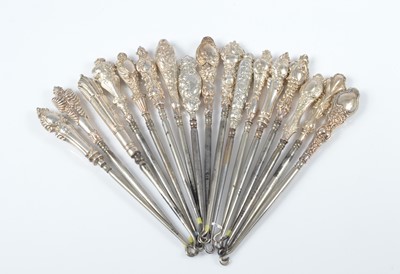 Lot 288 - Seventeen silver handled steel button hooks