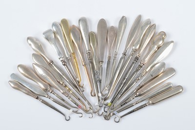 Lot 299 - A collection of plain silver handled steel button hooks