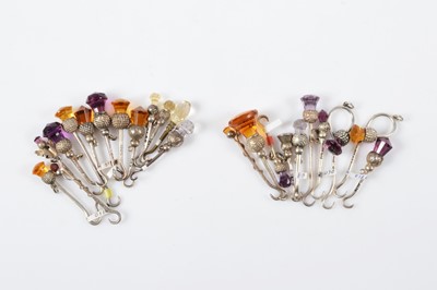 Lot 316 - A collection of small silver button or glove hooks