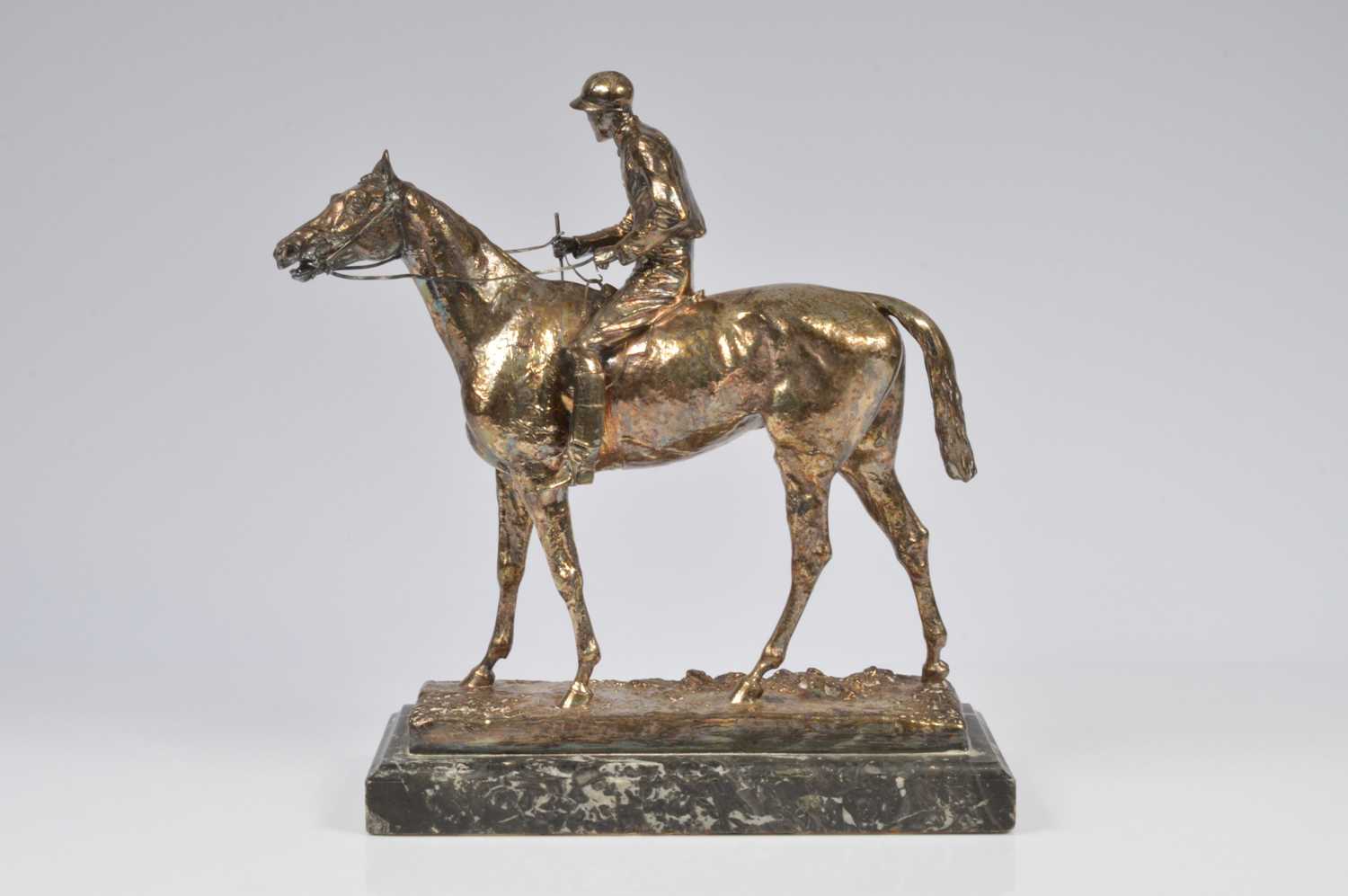 Lot 318 - A late Victorian silver plated model of a race horse and jockey by Elkington & Co and designed by Adrian Jones