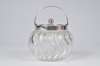 Lot 343 - An Edwardian cut glass and silver biscuit barrel by J.G & S