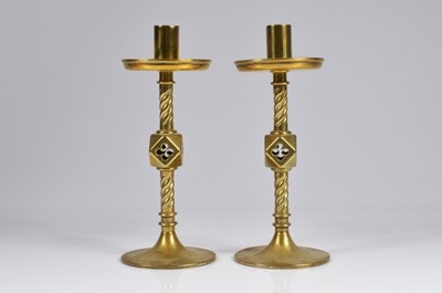 Lot 349 - A pair of late Victorian brass candlesticks