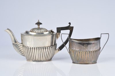 Lot 406 - A George V silver bachelors teapot