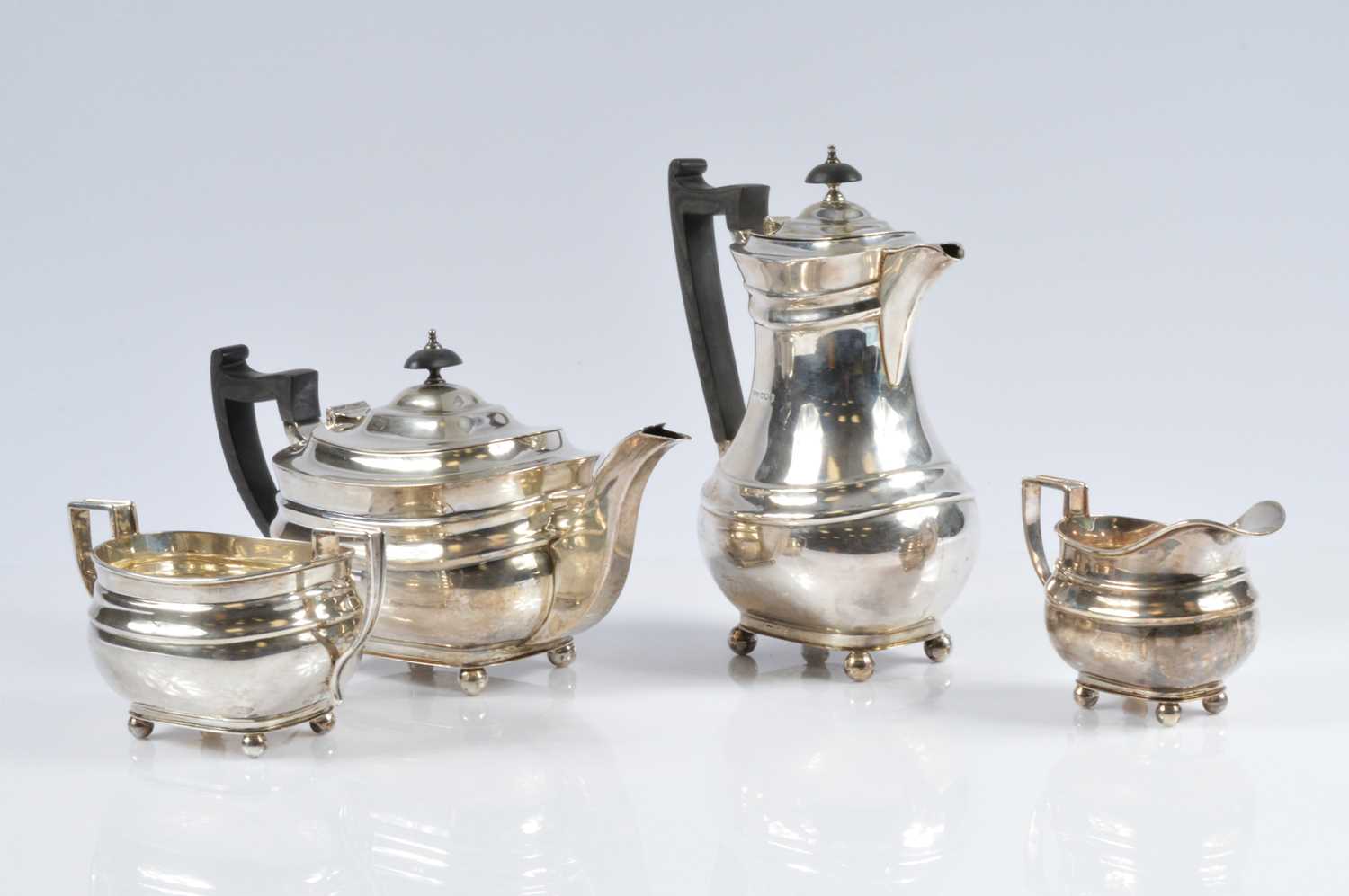 Lot 424 - A 1950s silver four piece coffee and tea set