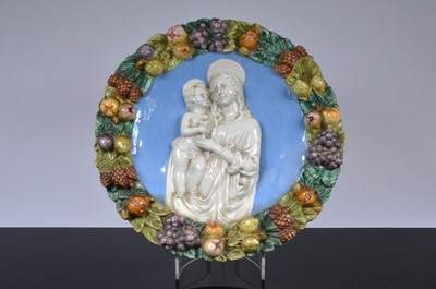 Lot 96 - A mid-20th century Italian pottery plaque of a Madonna and Child