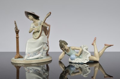 Lot 106 - A Lladro porcelain figure and a Nao porcelain figure