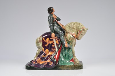 Lot 135 - A large Royal Doulton pottery figure of St. George