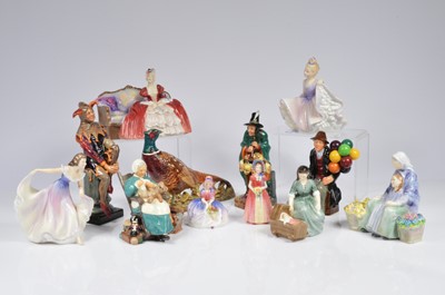 Lot 136 - Ten Royal Doulton pottery figures and a Beswick figure of a Pheasant