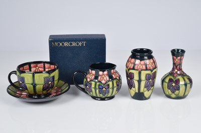 Lot 167 - Four modern Moorcroft Pottery Violet pattern items