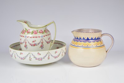 Lot 172 - An Edwardian Royal Doulton wash basin and jug set and a large Art Deco early Poole jug