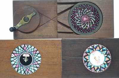 Lot 12 - Three Mahogany Mounted Kaleidoscopic Hand Cranked  Rotary Magic Lantern Slides