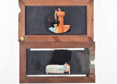Lot 24 - Twenty Six Mahogany Mounted Humorous Themed Slipping Magic Lantern Slides