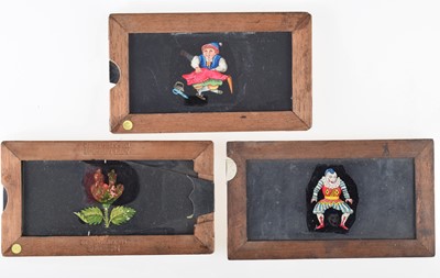 Lot 26 - Twenty Five Mahogany Mounted Slipping Magic Lantern Slides